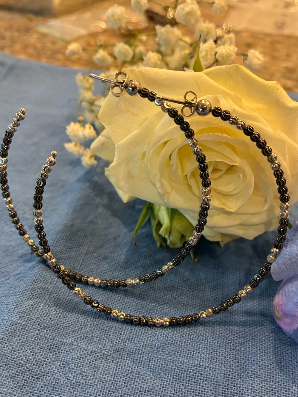 Diamond Cut Black & White Carved Beaded Pierced Extra Large Hooped Earrings.